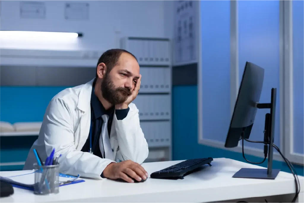Frustrated ASC administrator dealing with day-of surgery cancellations due to missing agency staff credentials